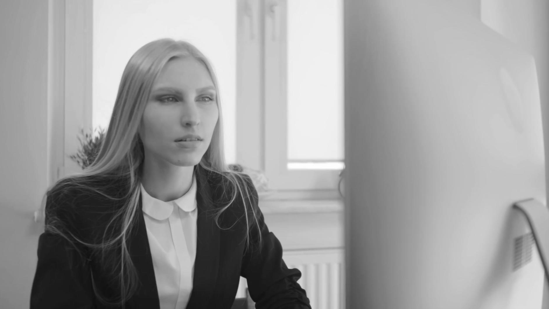 Student reviewing journalistic content with detailed annotations and editorial marks