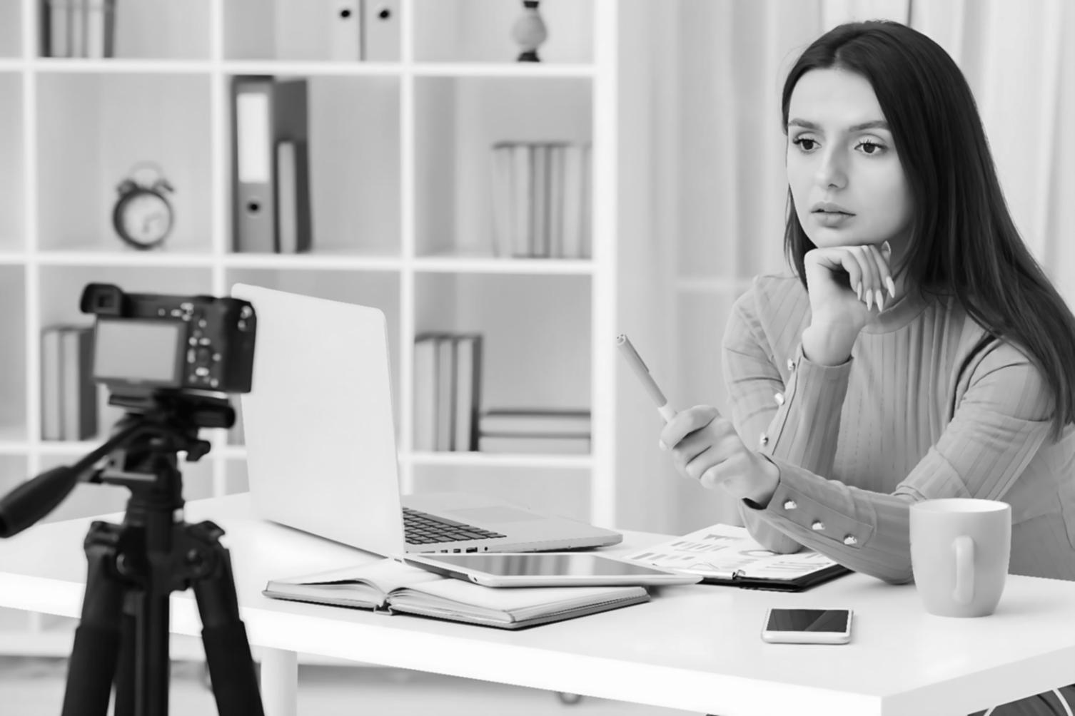 Professional proofreading workspace with documents and editing tools